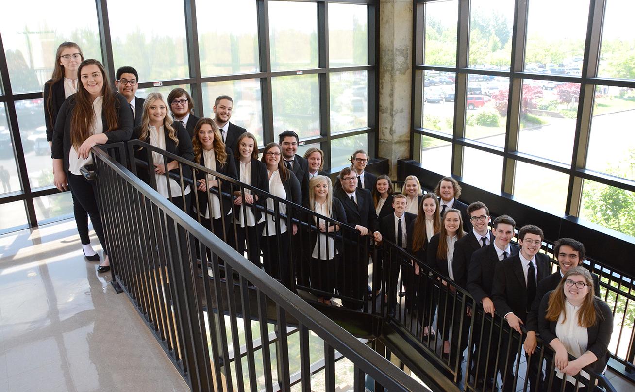 Choir on Stairs in Madrone Hall