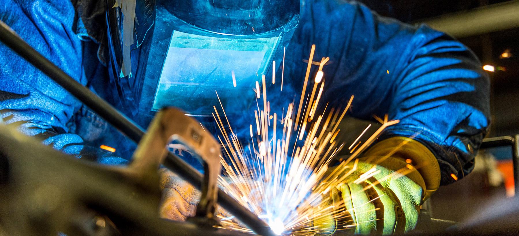 image of a student welding
